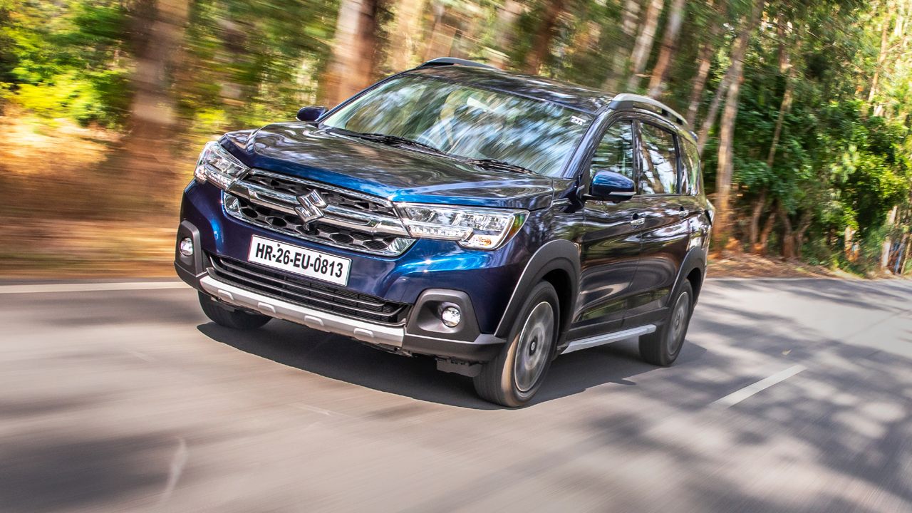 Nexa Blue Maruti Suzuki XL6 Left Side and Front View